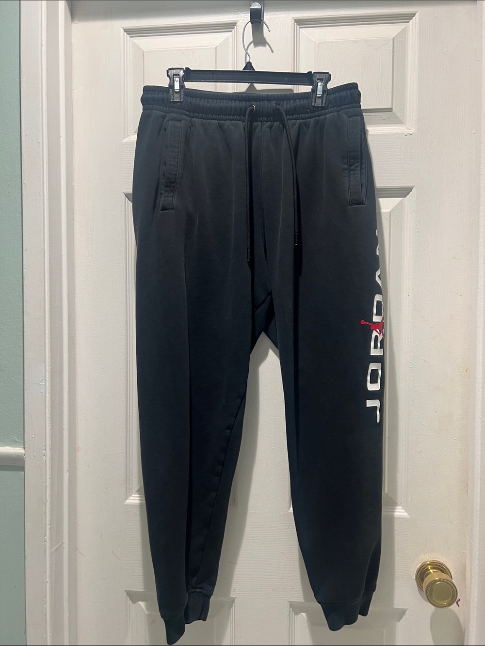Jordan Black Joggers with White & Red Side Logo